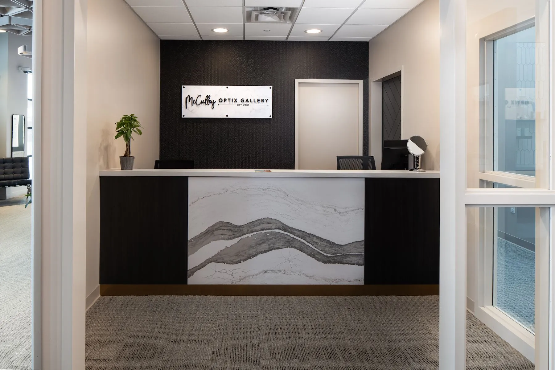 Modern Reception Area at McCulley Optix Gallery Featuring Contemporary Design - mcculley optix gallery